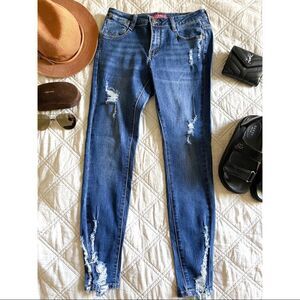 Blue denim skinny distressed jeans